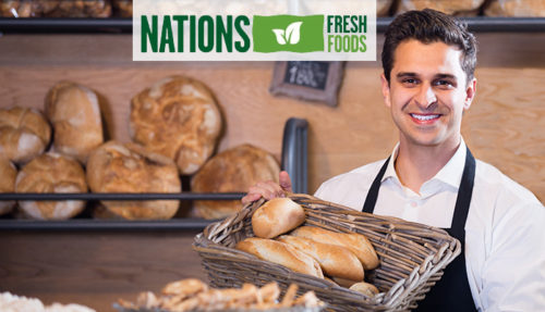 Man selling fresh pastry and baguettes in local tea-room